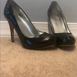 Black patent leather pumps